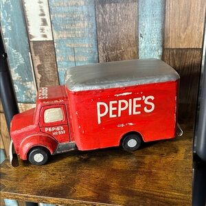 Norman Rockwell red Pepie’s metal vintage look decor